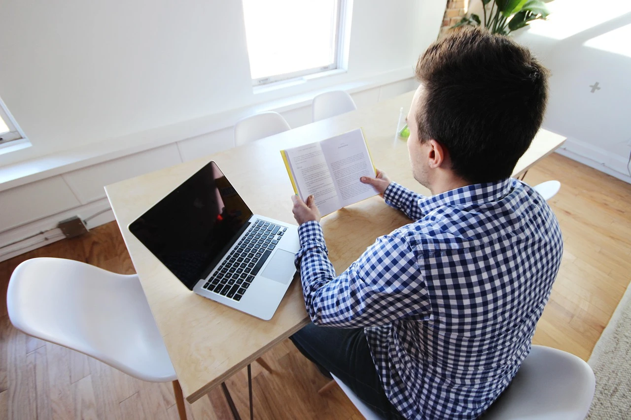 photo-of-people-holding-laptop-3747130