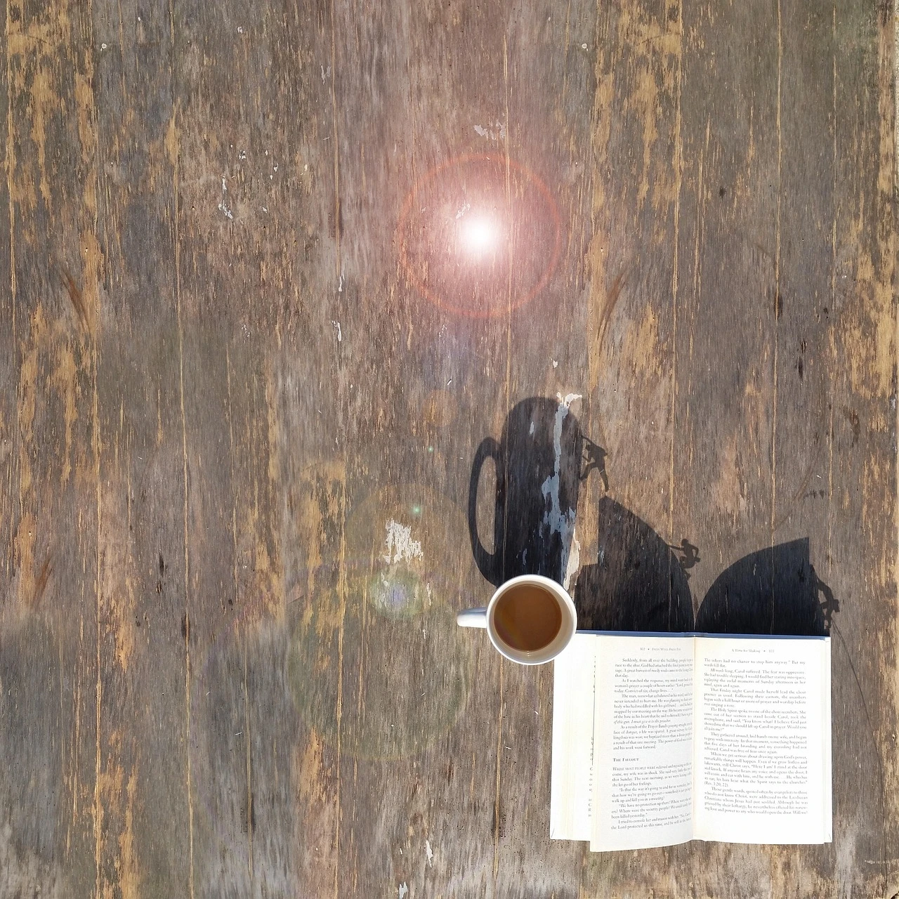top-view-of-a-book-and-a-cup-of-tea-surrounded-with-an-3193647